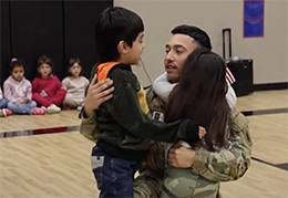  Army Sergeant Hugs His young daughter and young son